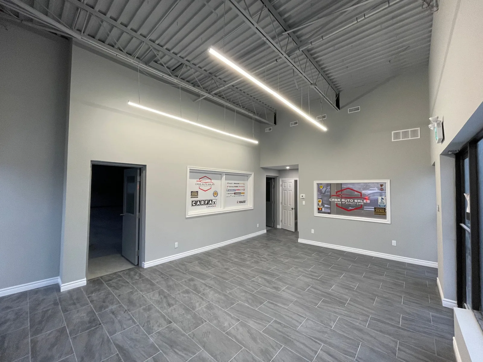 Renovated commercial space with new flooring and lighting