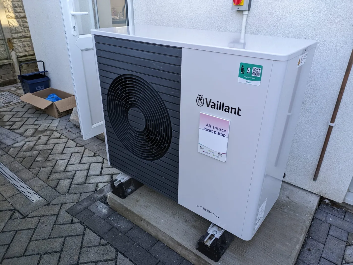 Air-source heat pump installed outside a home
