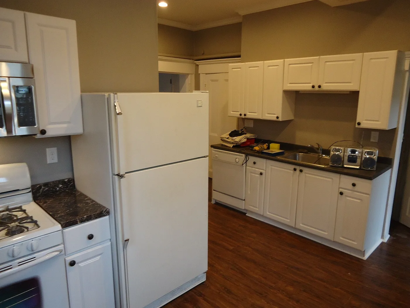 Bright kitchen with white shaker cabinets