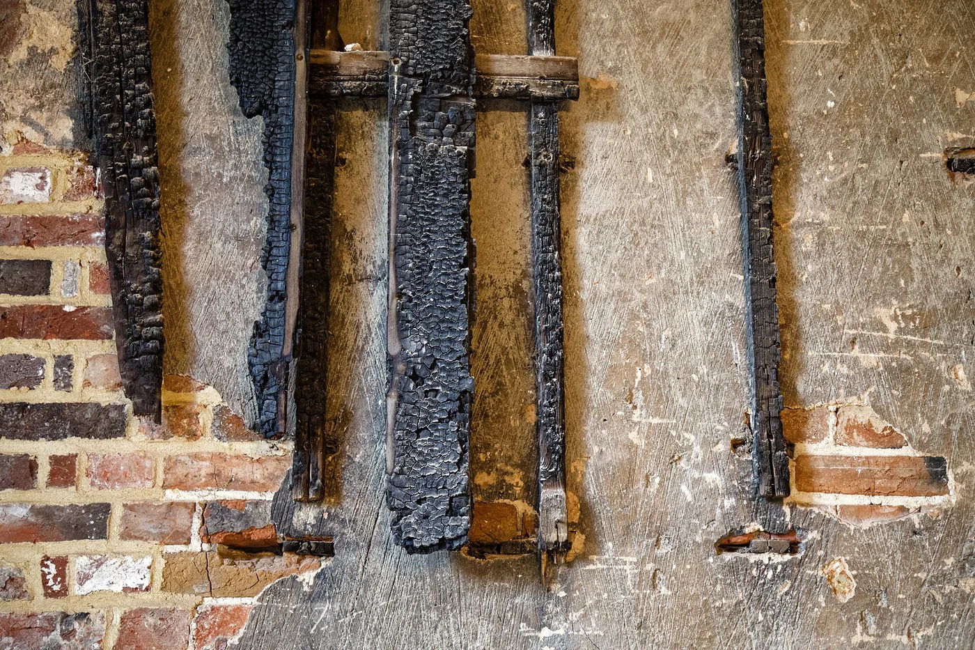 Charred wall studs after a fire