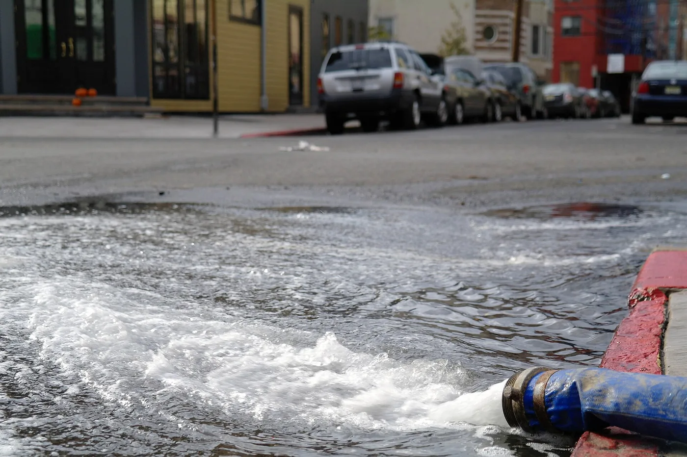 Pump hose removing floodwater